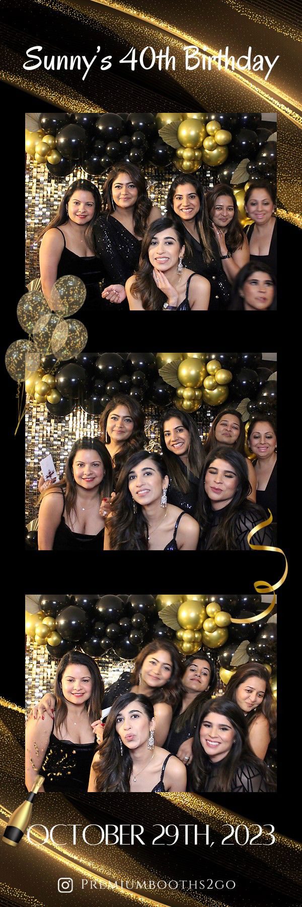Group of seven women posing with gold and black party decorations.