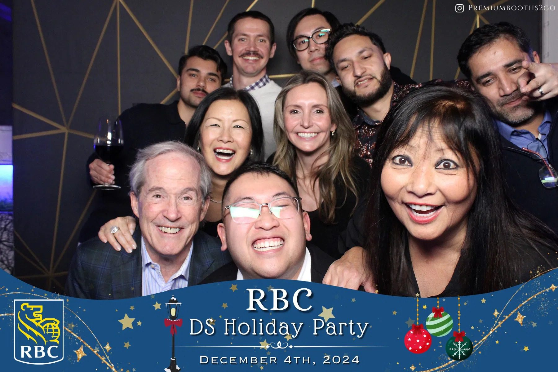 Group of colleagues smiling at RBC DS Holiday Party, December 4, 2024.