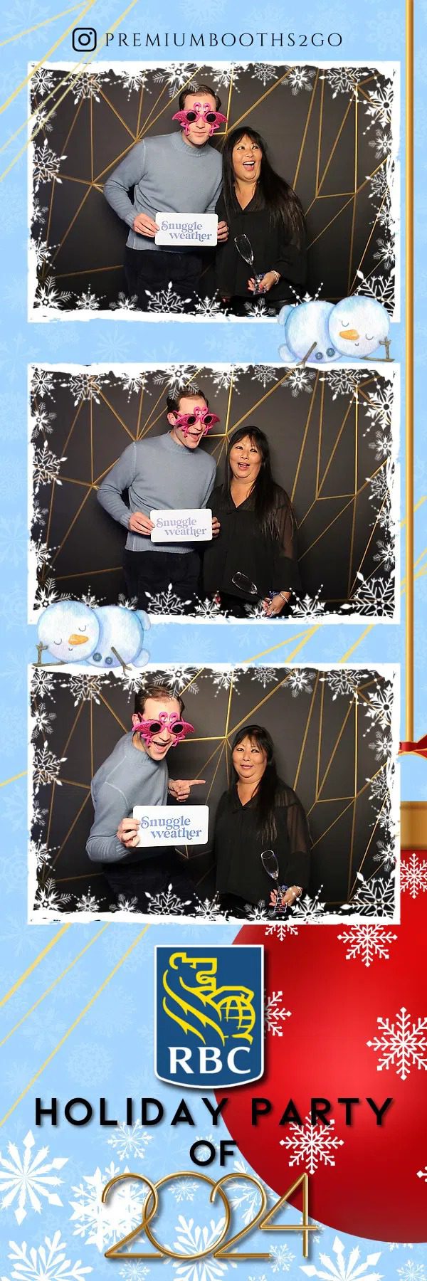 Two people posing with humorous signs in a festive photo booth.