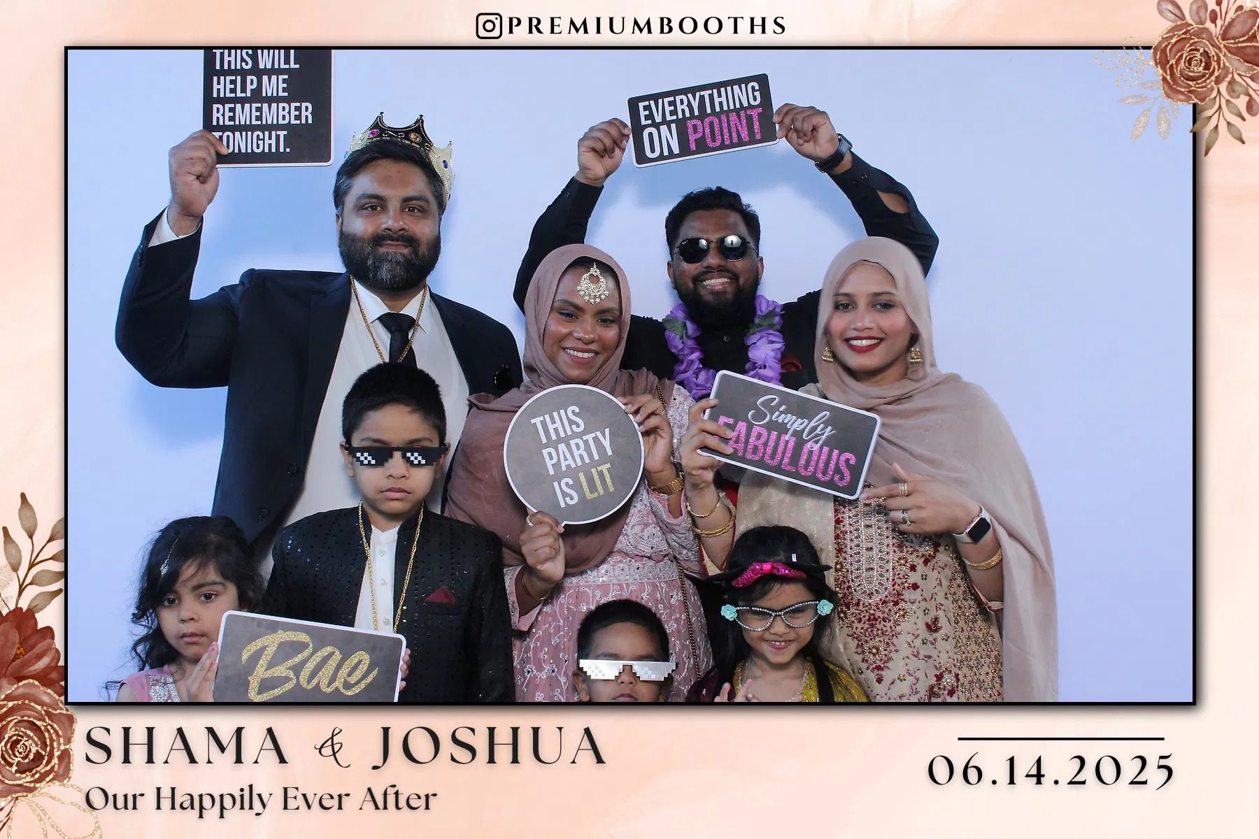 A joyful family celebrating with signs at a special event.