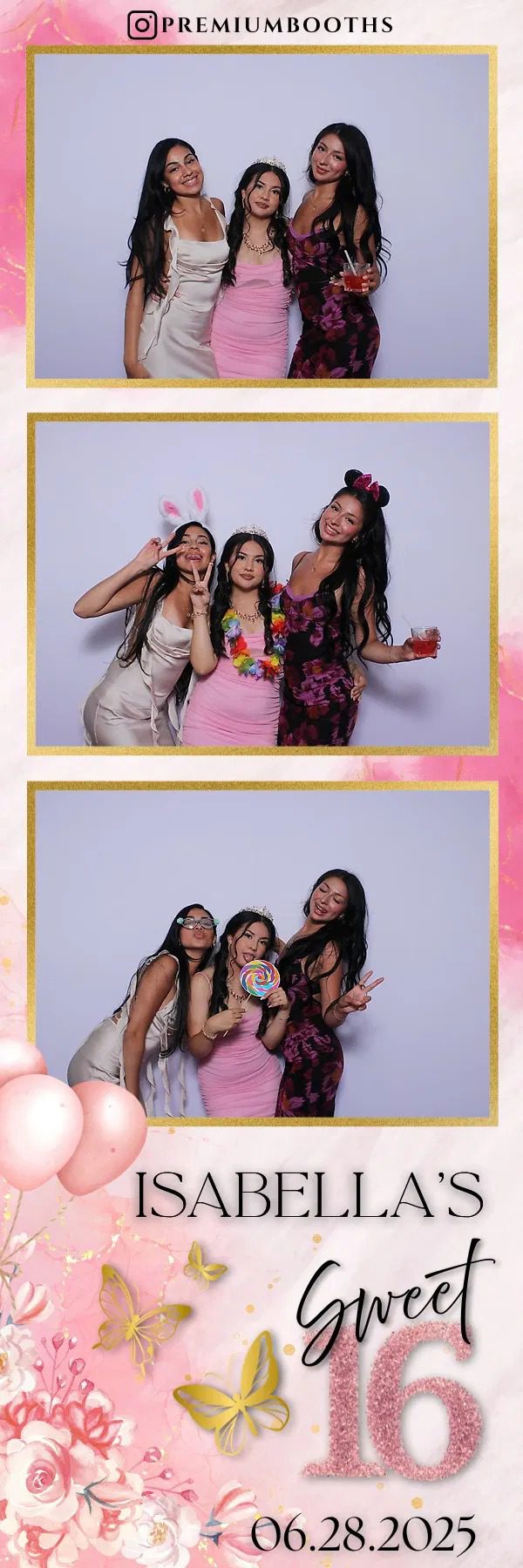 Three women posing happily in a photo booth with festive accessories.