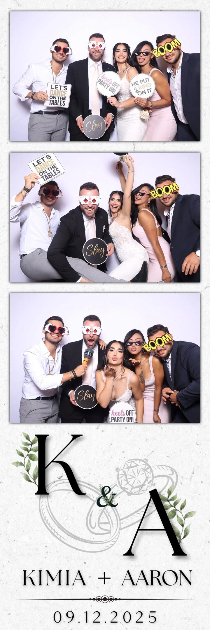 Four friends dressed formally, posing with playful props at a photo booth.