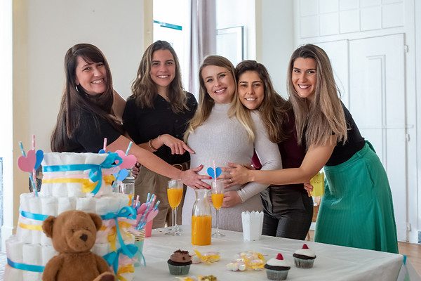 Group celebrating baby shower