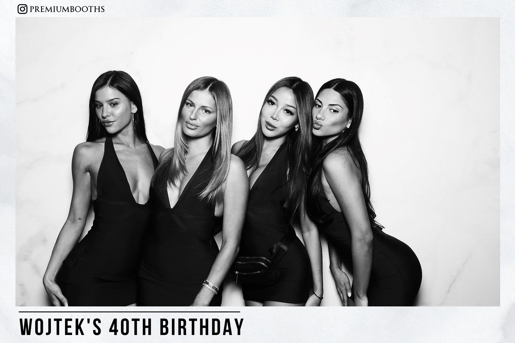 Four women in elegant black dresses posing at a 40th birthday party.
