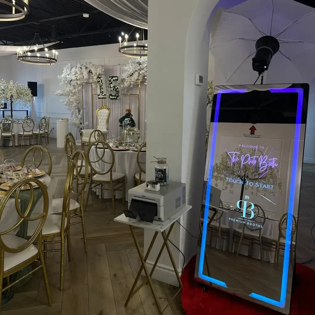 A cozy indoor café with elegant chairs and a neon-lit mirror.